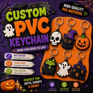 May include: A collection of six Halloween-themed PVC keychains featuring a skull, a black cat in a witch hat, a jack-o'-lantern, a bubbling cauldron, a ghost, and a haunted house. The display includes text promoting custom PVC keychain services.