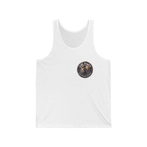 May include: White tank top with a round emblem that reads "GIRL POWER" in a circular design. The emblem features a silhouette of a woman and the words "FOR STRONG WOMEN".