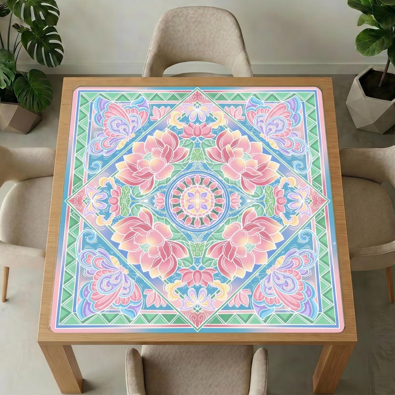 Wooden dining table with beige chairs and plants, topped with the pastel lotus mahjong table mat covering the whole tabletop.