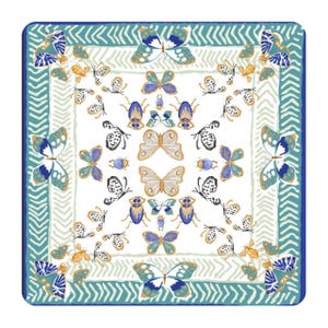 Flat product image of a square mahjong table mat with a white center, blue and gold butterflies and insects, mint zigzag border and teal outer frame.