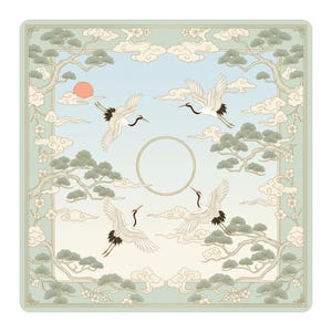 Flat product image of a square mahjong table mat featuring white cranes flying around a golden circle, framed by pine trees and cream clouds on a soft blue sky background.