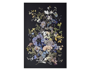 May include: A pressed flower arrangement featuring a variety of blue, purple, and yellow flowers on a black background.