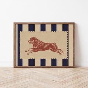 May include: A framed print featuring a dark red illustration of a running dog centered on a tan, scalloped-edge rectangular background. The background behind the central panel consists of vertical navy blue and tan stripes in a wooden frame.
