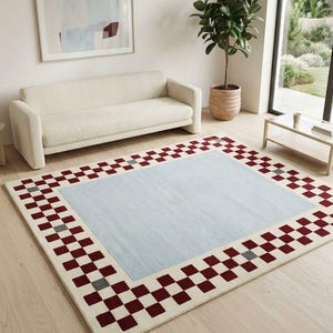 Geometrisch vloerkleed met dambordrand - Handgetuft pluche wollen tapijt in mid-century modern stijl