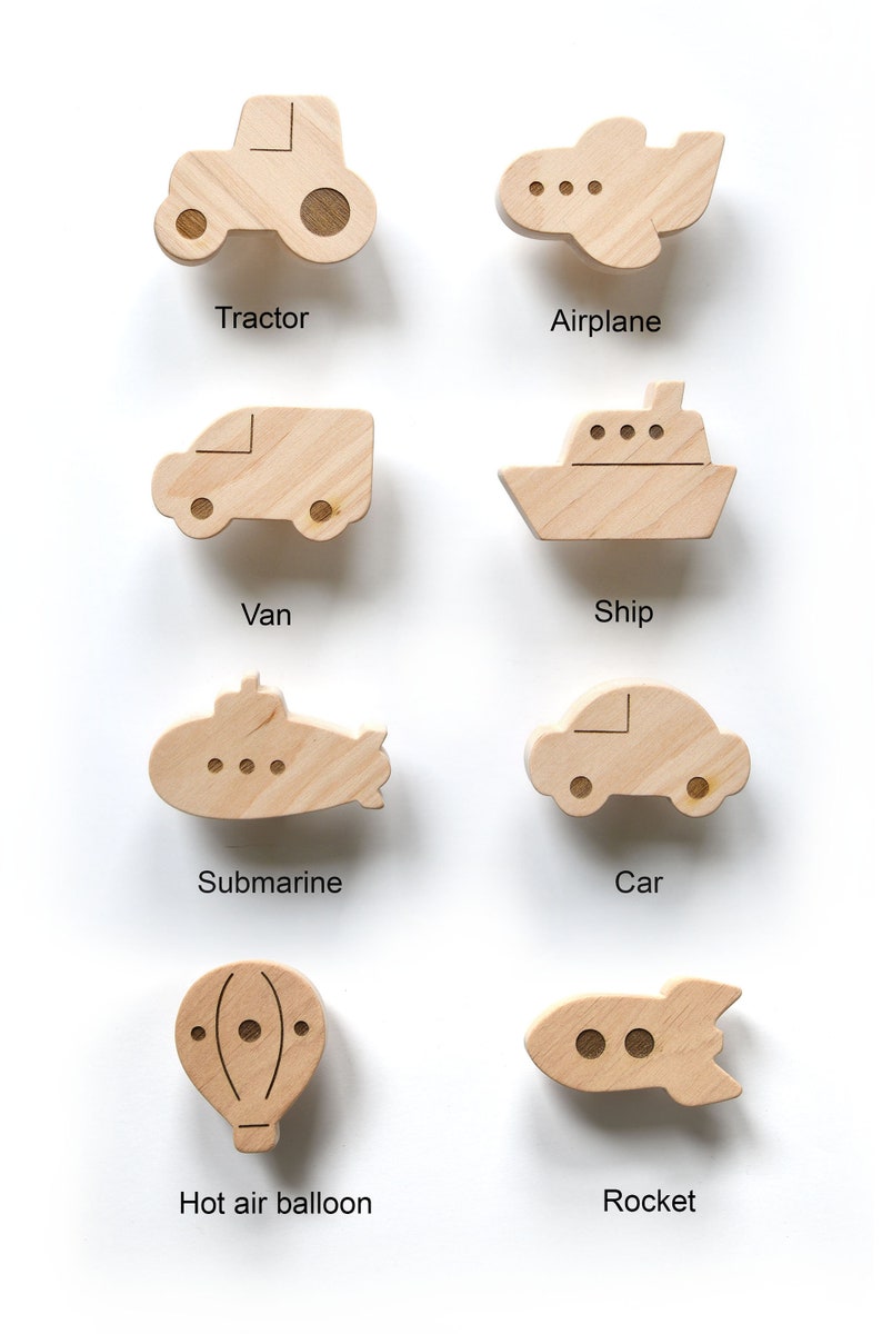8 vehicle wall hooks including Car, Van, Tractor, Airplane, Ship, Submarine, Rocket, and Hot Air Balloon.