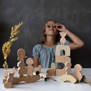 Play with wooden family figures