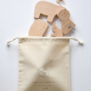 wooden animals and storage bag