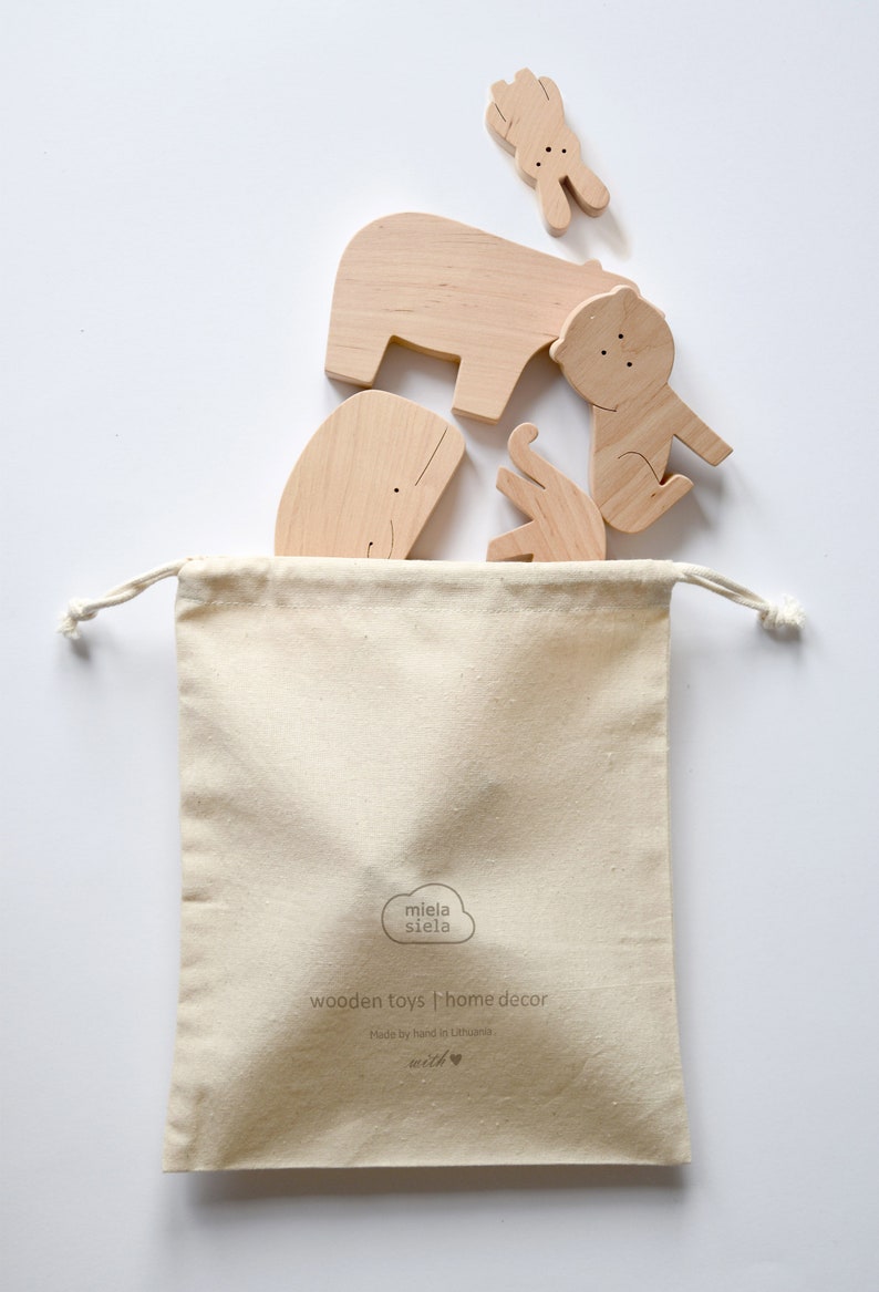 wooden animals and storage bag