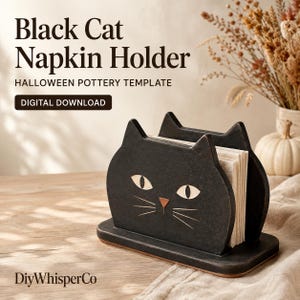 Könnte beinhalten: Ein schwarzer Serviettenhalter in Katzenform mit weißen mandelförmigen Augen, einer kleinen dreieckigen Nase und feinen Schnurrhaaren. Der Text lautet: Black Cat Napkin Holder, HALLOWEEN POTTERY TEMPLATE, DIGITAL DOWNLOAD und DiyWhisperCo.