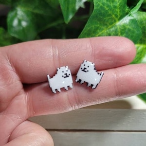 Annoying dog stud earrings// Stainless steel, resin, plastic.