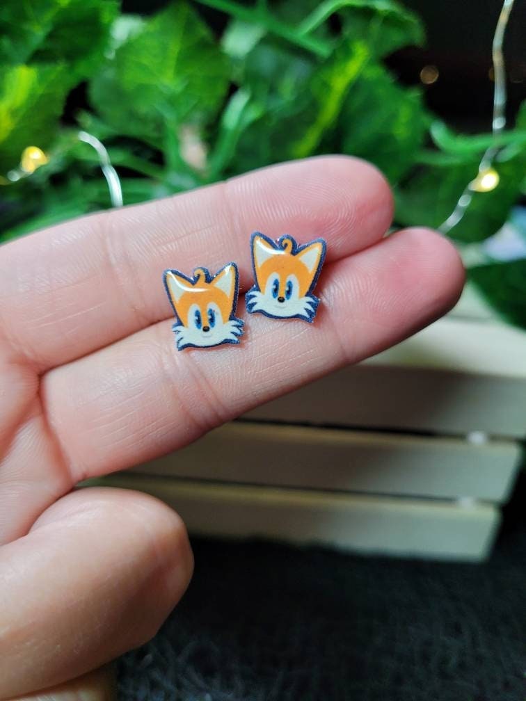 Video game stud earrings// Stainless steel, resin, plastic.