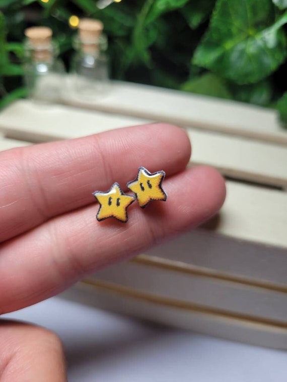 Video game star stud earrings.