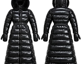 May include: A long, glossy black puffer coat featuring a high-shine finish, horizontal quilted panels, a waist belt with a buckle, and a hood trimmed with thick black faux fur. The coat includes matching black mittens attached to the sleeves.