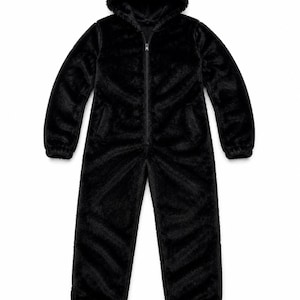 May include: A solid black one-piece jumpsuit made of a plush, fuzzy material. This garment features a full-length front zipper, a hood, long sleeves with ribbed cuffs, and long pant legs with ribbed hems, providing a uniform, textured appearance.