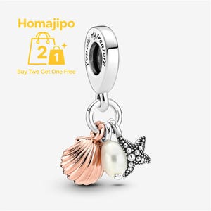 May include: A silver charm bead featuring the engraved text 'You are my treasure' on the bail, with three dangling pendants: a rose gold-toned seashell, a smooth white pearl, and a textured silver starfish with small raised dots.