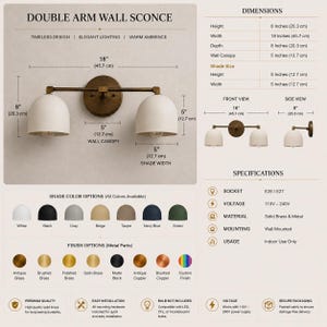 May include: A double arm wall sconce with a brass finish and two white dome-shaped shades. The fixture measures 18 inches wide, 8 inches high, and 8 inches deep. It features a 5-inch wall canopy, E26/E27 socket compatibility, and 110V-240V voltage.