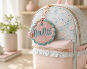 Etiqueta de identificación bordada personalizada: Etiqueta personalizada para mochila con cierre