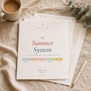 May include: A stack of white paper planners titled The Summer System by Anchor & Arc. The cover features text in rust and teal, with a row of five colored rectangles labeled Academic, Project, Creative, Movement, and Scheme. It includes the 2024 edition.