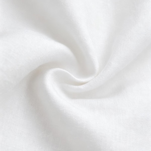 May include: A solid white fabric with a visible woven texture, featuring a central swirl or spiral fold that creates soft, natural shadows and highlights across the surface, emphasizing the material's light, breathable, and slightly translucent quality.