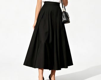 Zwarte A-lijn midi-rok voor vrouwen Elegante soepelvallende hoge taille rok met zakken Casual chique zomer herfst outfit kantoor klaar rok