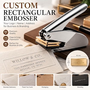 May include: A silver metal rectangular embosser with a handle and a gold-toned plate. The device creates impressions on paper, shown with a sample card reading WILLOW & CO. 1234 OAKRIDGE AVENUE AUSTIN, TX 78701. A diagram shows the plate is 45 mm by 23 mm.