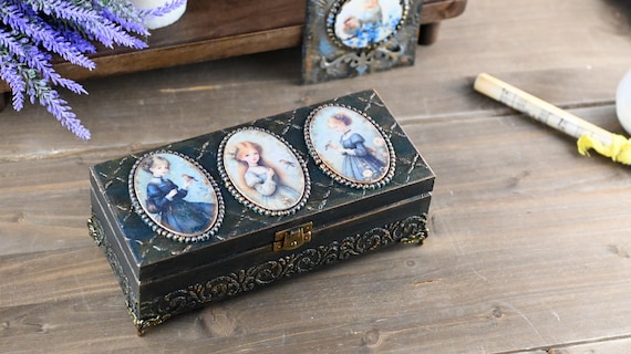 Hand-decoupaged Victorian portrait box with a brooding, gothic antique aesthetic — the kind of thing you'd find in a curiosity shop and immediately need.