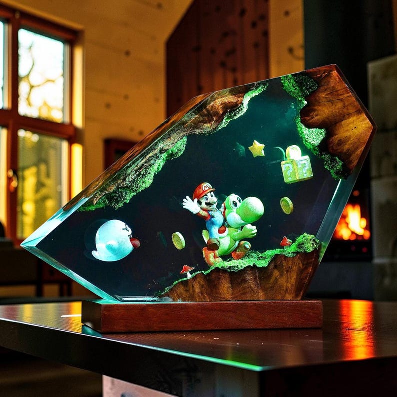 May include: A decorative lamp featuring a resin-encased diorama of Mario riding Yoshi, a Boo ghost, gold coins, a question block, and a star. The scene is set within a polished wood frame with natural edges, mounted on a rectangular wooden base.