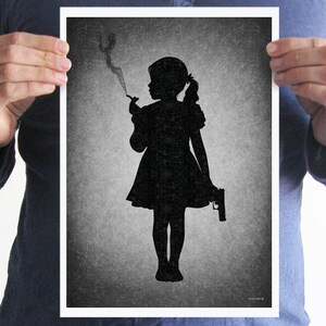 May include: Black and white silhouette of a girl holding a gun and smoking a cigarette. The image is on a textured gray background.