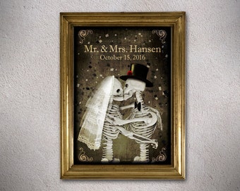 May include: A framed illustration of two skeletons dressed as a bride and groom, kissing. The bride wears a white veil and the groom wears a top hat. The text reads "Mr. & Mrs. Hansen. October 15, 2016."