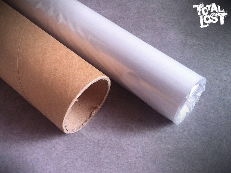 May include: Two cylindrical tubes, one brown and the other white, are positioned diagonally. The brown tube is open at one end, revealing its hollow interior. The white tube is wrapped in clear plastic. The text "TOTAL LOST" is in the upper right corner.