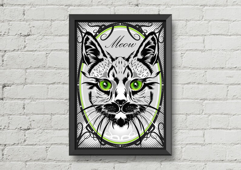 Puede incluir: Una ilustraci&oacute;n en blanco y negro de la cara de un gato con ojos verdes, enmarcada en un marco ovalado decorativo con la palabra "Meow" en el centro. El fondo es un patr&oacute;n de rayas grises y blancas.