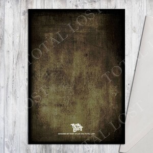 May include: A dark green textured card with the text "TOTAL LOST" in white lettering. The card is designed by "RANY XLAN AKA TOTAL LOST".