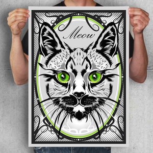 Puede incluir: Ilustraci&oacute;n en blanco y negro de la cara de un gato con ojos verdes. El gato est&aacute; rodeado de un marco decorativo con la palabra "Meow" en el centro.