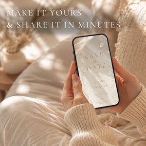 May include: A smartphone displaying a digital Save the Date wedding announcement with the text SAVE THE DATE, CLAIRE & THOMAS, 28 JUNE 2025. The screen features a soft, neutral-toned floral design. The text MAKE IT YOURS & SHARE IT IN MINUTES is visible.
