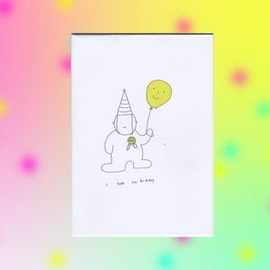 Könnte beinhalten: Eine weiße Grußkarte mit einer einfachen schwarzen Strichzeichnung einer Figur, die einen gestreiften Partyhut und eine kleine Anstecknadel trägt und einen gelben Luftballon hält. Unter der Figur steht der Text, I hate my birthday, in kleiner schwarzer Schrift.