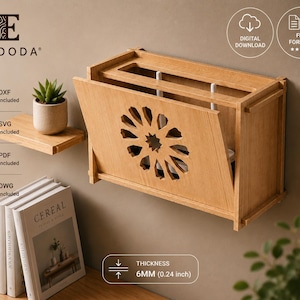 Può includere: Una scatola porta router in legno marrone chiaro da montare a parete, caratterizzata da un motivo decorativo a stella ritagliato sul pannello frontale. La scatola ha uno spessore di 6 mm e include file digitali in formato DXF, SVG, PDF e DWG.