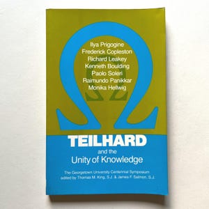 May include: A book cover with a blue and green design. The title "TEILHARD and the Unity of Knowledge" is displayed in white text. The cover also lists names such as Ilya Prigogine and Richard Leakey.