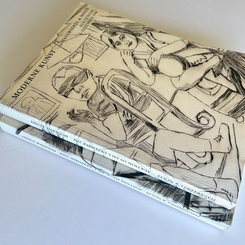 May include: A black and white illustration of two people sitting in chairs. The illustration is on the cover of a book titled "Moderne Kunst" with the text "Hauswedell & Nolte Auktion 339 am 5. Dezember 1998" on the spine.