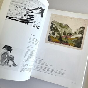 May include: A black and white illustration of a person sitting with their head down. The illustration is on a page from a book about art. The page also includes text about the artist Max Kaus and his work.