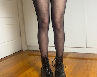 Svarta rutiga tunna strumpbyxor mörk akademia kontorssiren