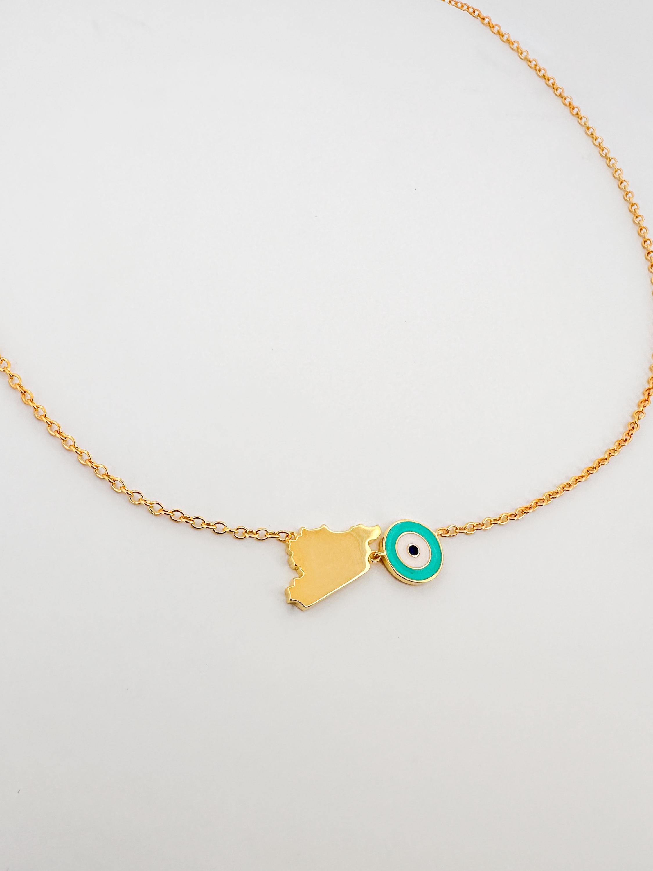 34 Discover Unique Map-Themed Jewelry for Your Next Adventure 3 Gold Syria Map Necklace: Evil Eye Charm, Turquoise Enamel