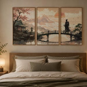 May include: A triptych wall art set featuring a Japanese-inspired landscape with a samurai standing on a bridge, a traditional building, cherry blossoms, and a mountain at sunset, rendered in muted peach, brown, and dark green tones.