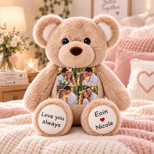 May include: A light brown plush teddy bear with a soft, fuzzy texture. The bear features a square photo collage on its chest showing a couple in four different poses. The left foot pad reads 'Love you always' and the right foot pad reads 'Eoin' with a red heart and 'Nicole'.