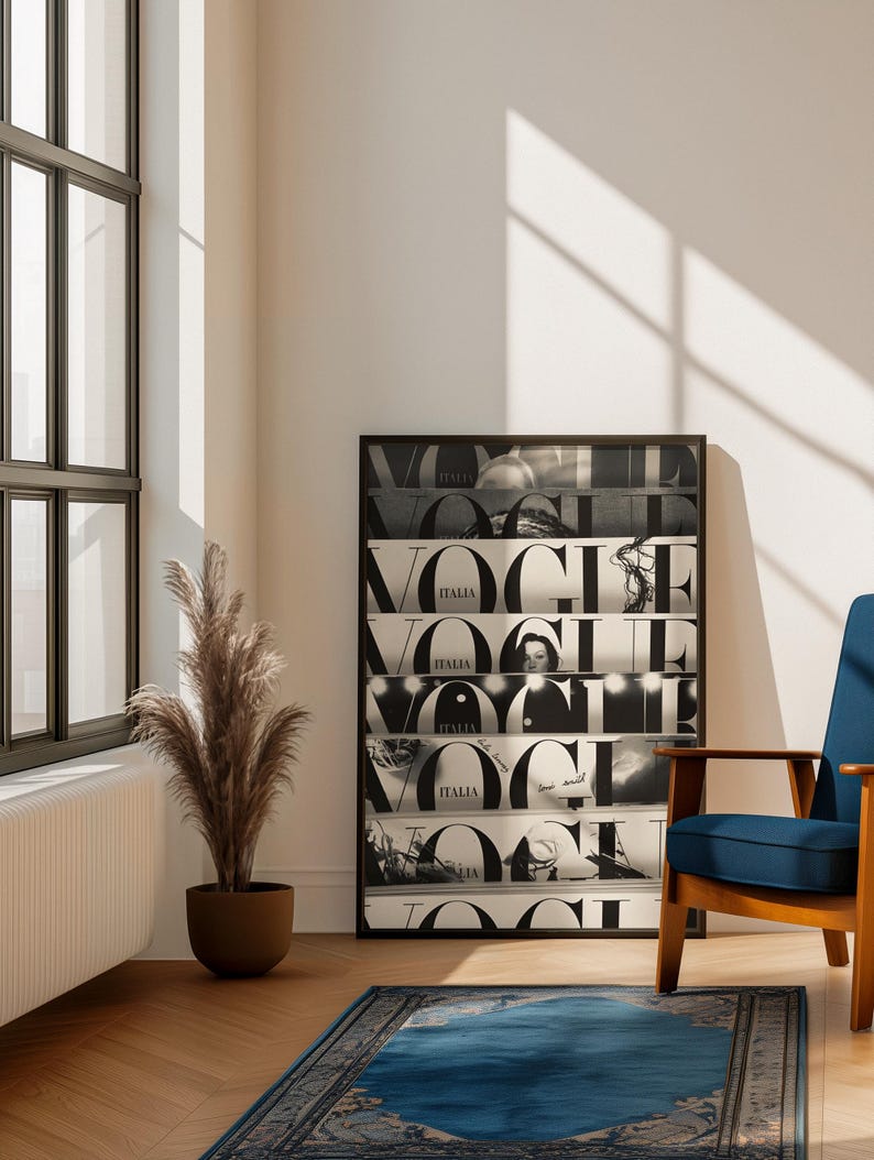 May include: A rectangular framed wall art piece featuring a collage of black and white Vogue Italia magazine covers stacked horizontally. The artwork displays the bold Vogue logo repeated across multiple segments, incorporating various photographic details.