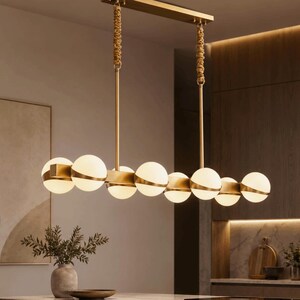 White globes with golden base linear kitchen island light fixture, contemporary chandelier for dining & lounge