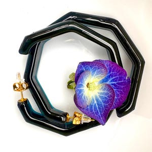 Handmade chunky resin angular hoop earrings in dark teal green with gold posts