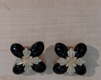 Vintage clip-on earrings with large black oval cabochons and rhinestones