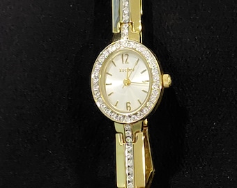Vintage, woman's gold-toned with rhinestone dress watch