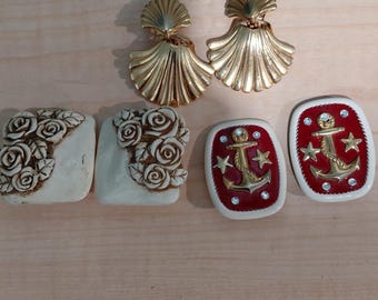 Set of 3-Vintage clip-on earrings. One gold, one off white with flowers, one red with gold anchors