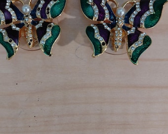 Vintage butterfly clip on earrings in gold tone with blue and green enamel wings